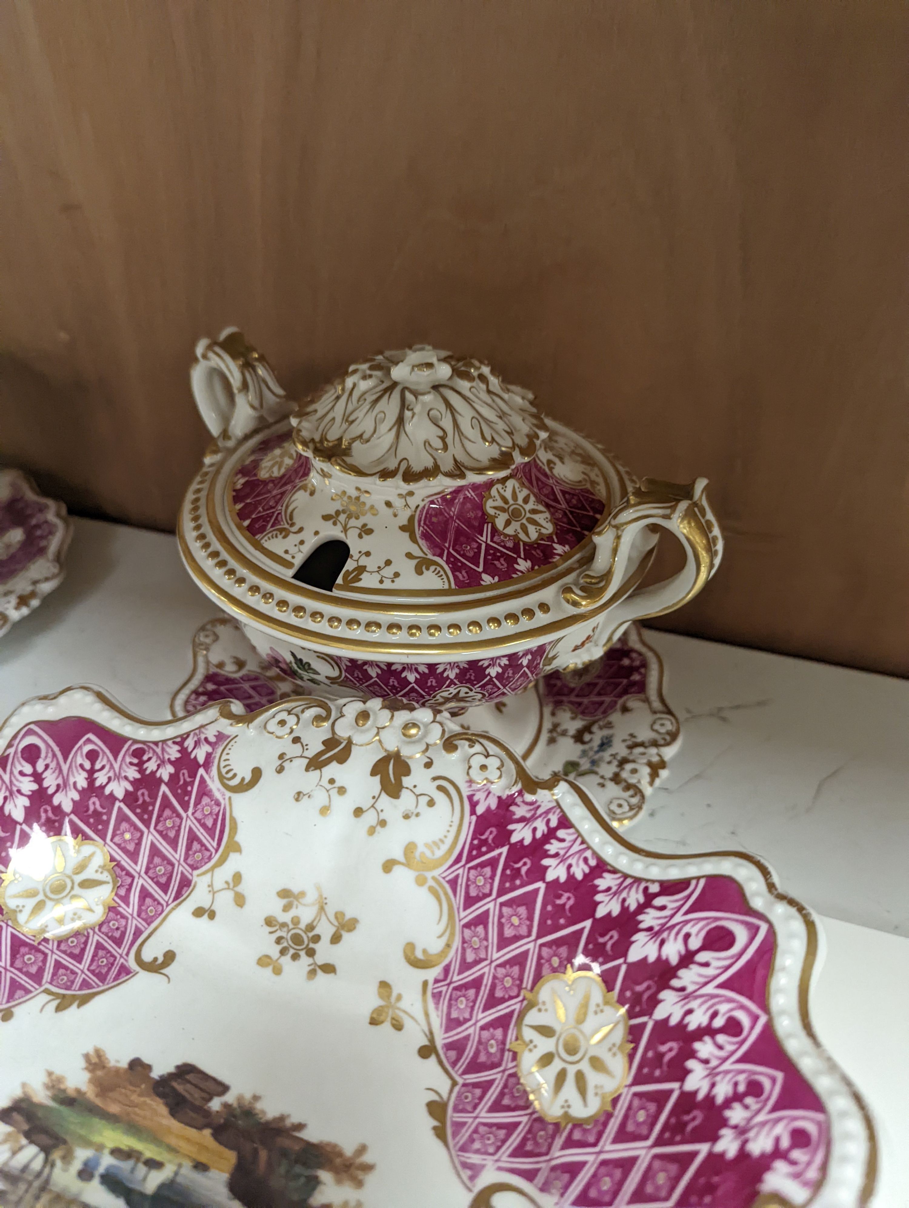 A Ridgways porcelain topographical part dessert service, c.1835, pattern number 2168, the sauce tureens and covers pattern number 2179